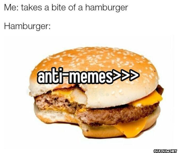 Me takes a bite of a...