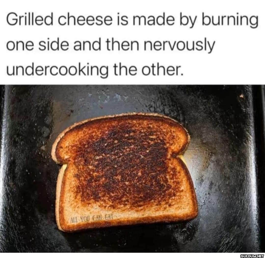 Grilled cheese is made by...