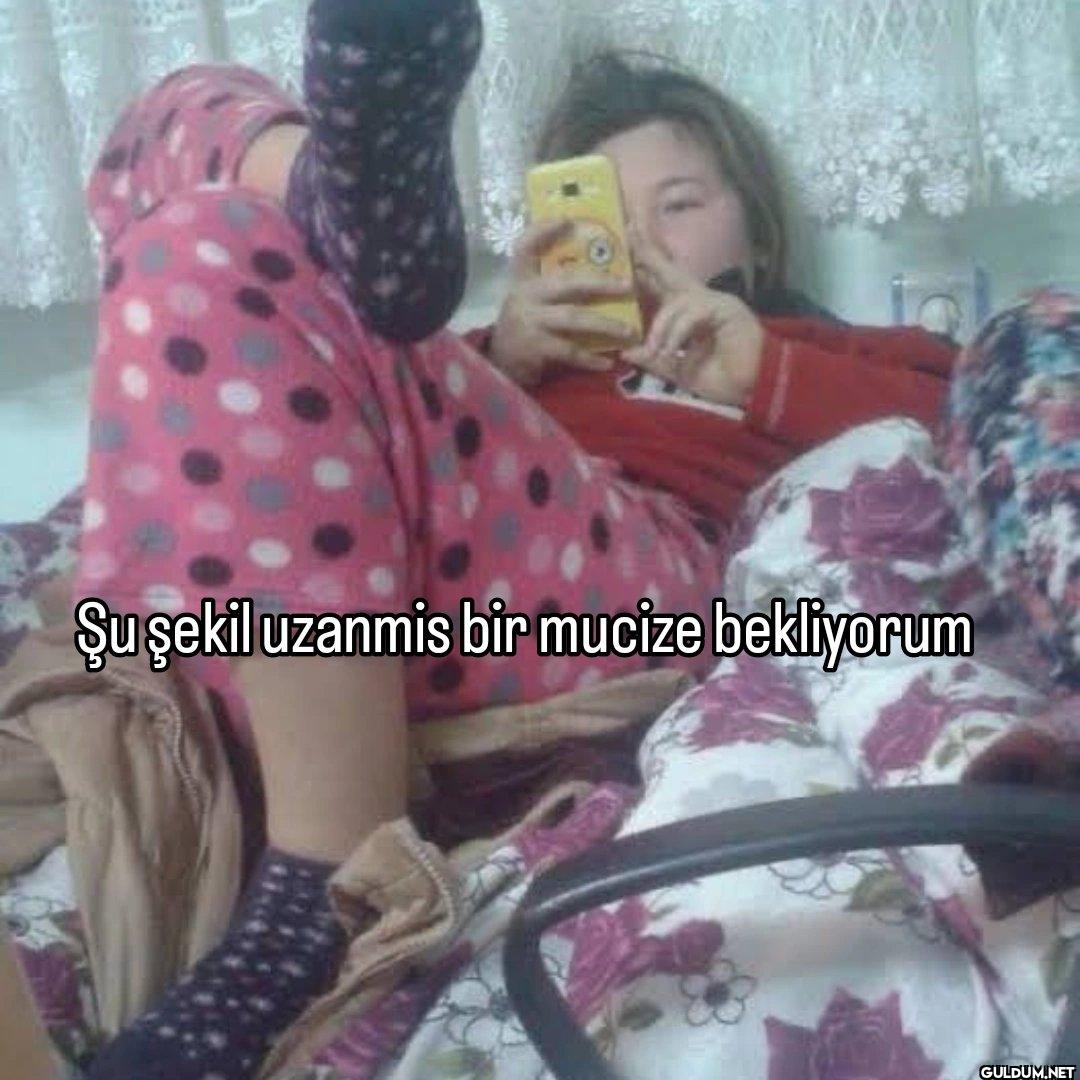 Şu şekil uzanmis bir...