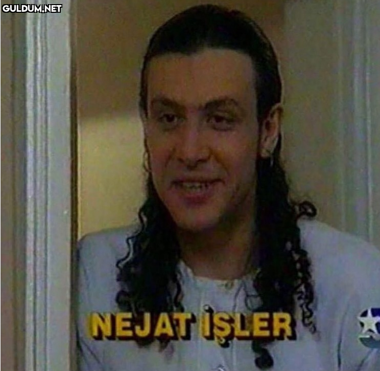 NEJAT İŞLER uzun saçlı eski hal.