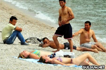 Metin sadece 'Kaynak'...
