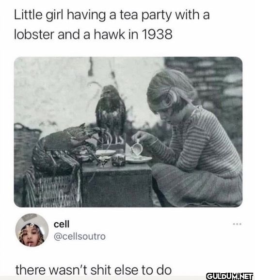 Little girl having a tea...