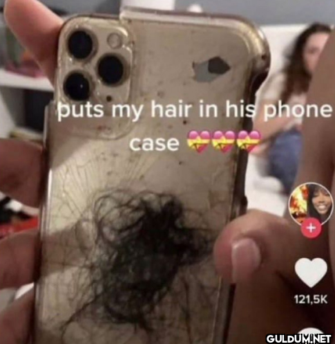 puts my hair in his phone...