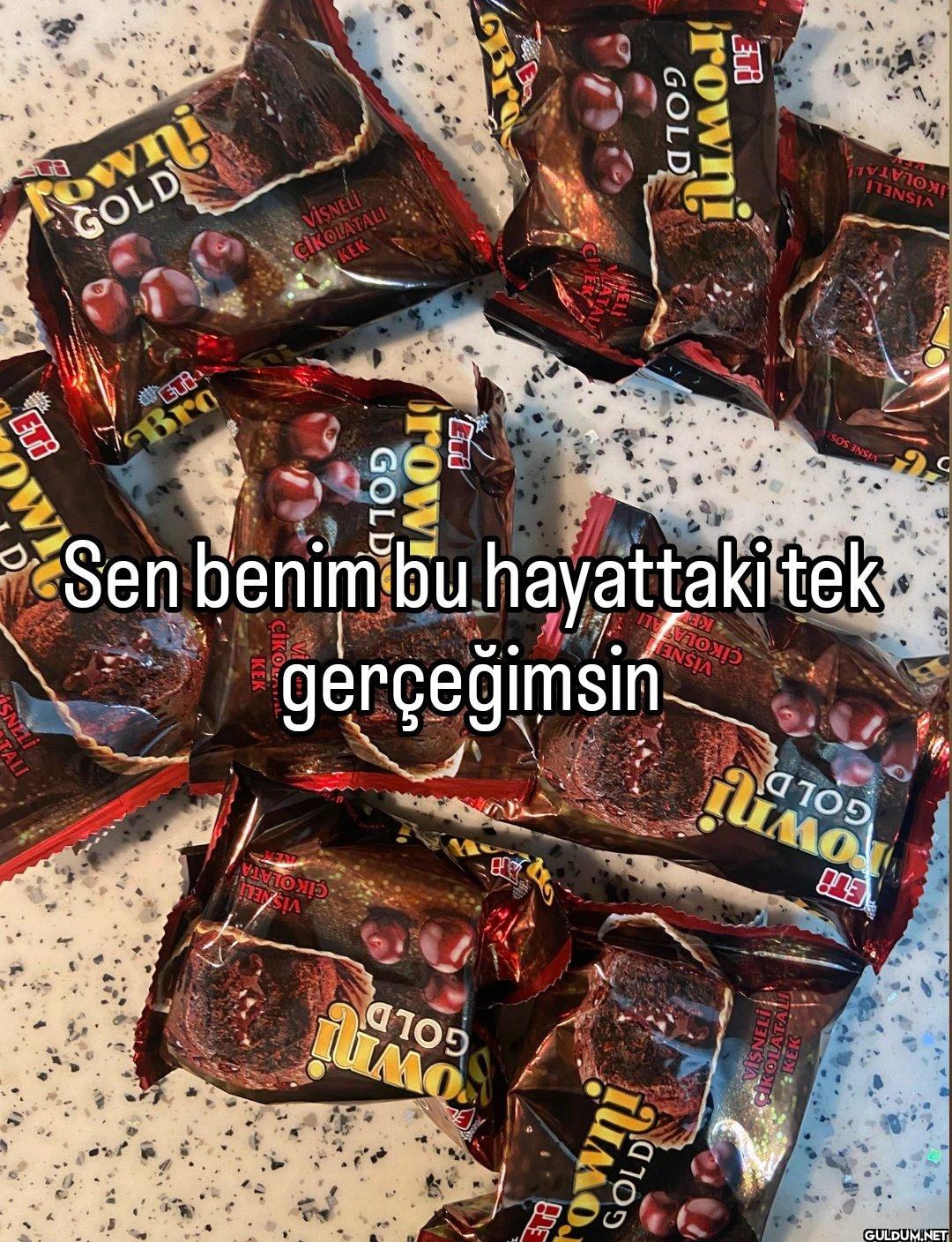 TALI SNELI ET W IM D GOLD...