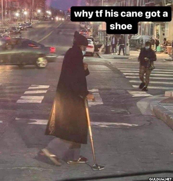 why tf his cane got a shoe
