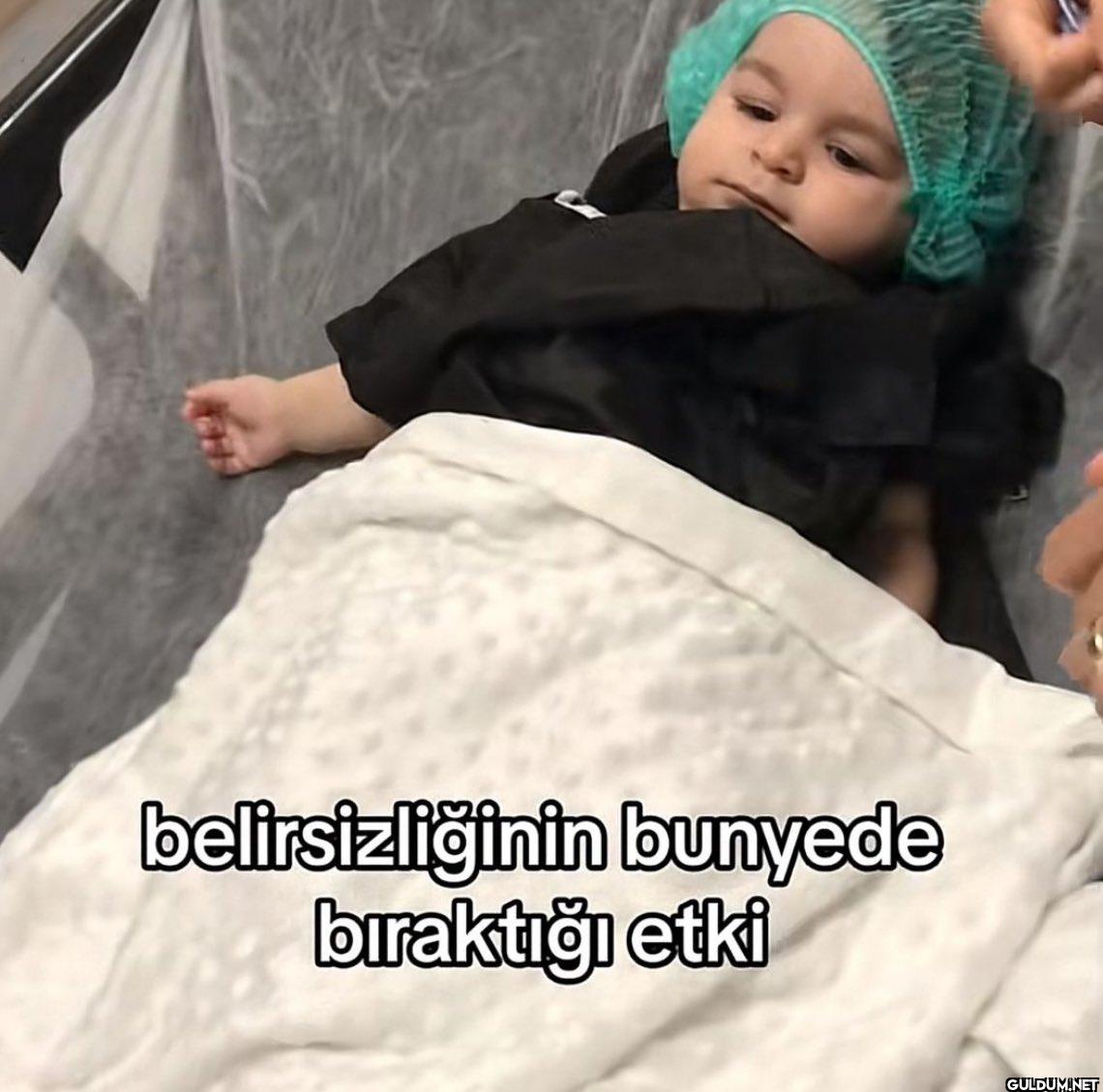 belirsizliğinin bunyede...